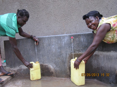 Collecting water at carer's kitchen